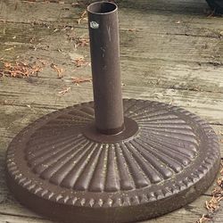 heavy umbrella stand $50, 42” vintage metal table w/flaws $70, side table $20