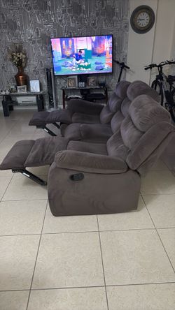 Brown recliner seats for 3 persons