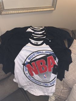 8 new NBA baseball style shirts 4 smalls 2 medium 2 large.