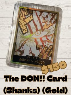 The "DON!! Card (Shanks) (Gold) - Premium Booster - The Best - Vol. 2"