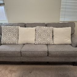 Gray Sofa with Patterned Cushions