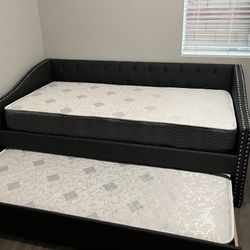 NEW TWIN DAYBEDS WITH MATTRESSES