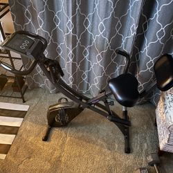 EXERCISE BIKE WITH PULL STRAPS !
