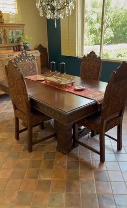 Carved table 6 chairs & 2 leaves