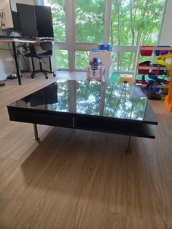 Black coffee table with 2 drawers