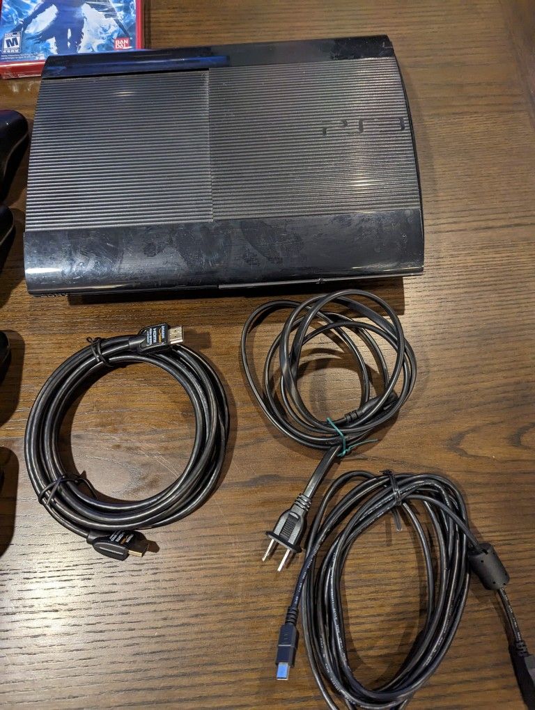 Playstation 3 With 18 Games And 3 Controllers for Sale in Glen Ellyn