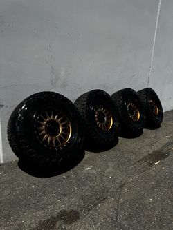 KMC KM552 IMS 8x6.5 20” Wheels Bronze with 35” Toyo Open Country AT3 All-Terrain Tires