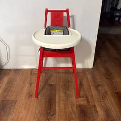 Red IKEA Baby High Chair