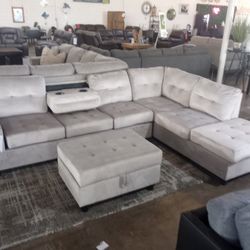 Gray Cupholder Sectional With Ottoman 