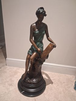 Estatua bronze