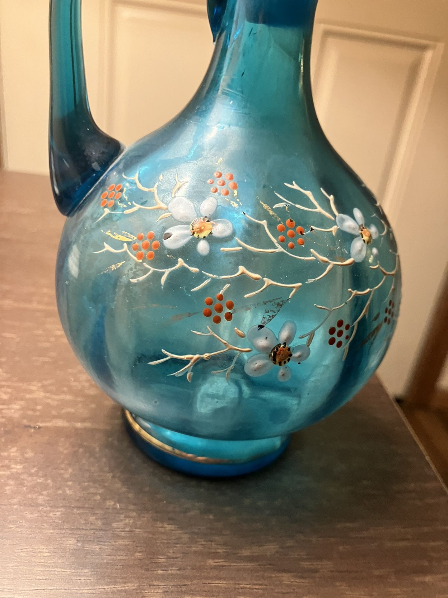 I’m not sure but I’m gonna call it an antique perfume bottle
