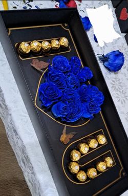 Love valentines.  Blue. Chocolate.  Roses . I love you