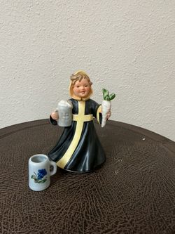 Ceramic Figurine Girl with Beer Stein and Radish