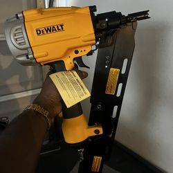 Yellow And Black Dewalt Nail Gun