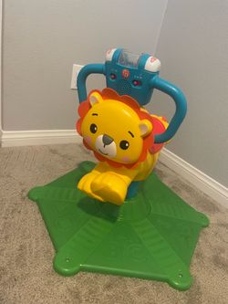 Lion spin jump toy