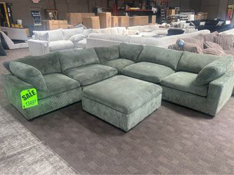 Gorgeous cloud green sectional and ottoman