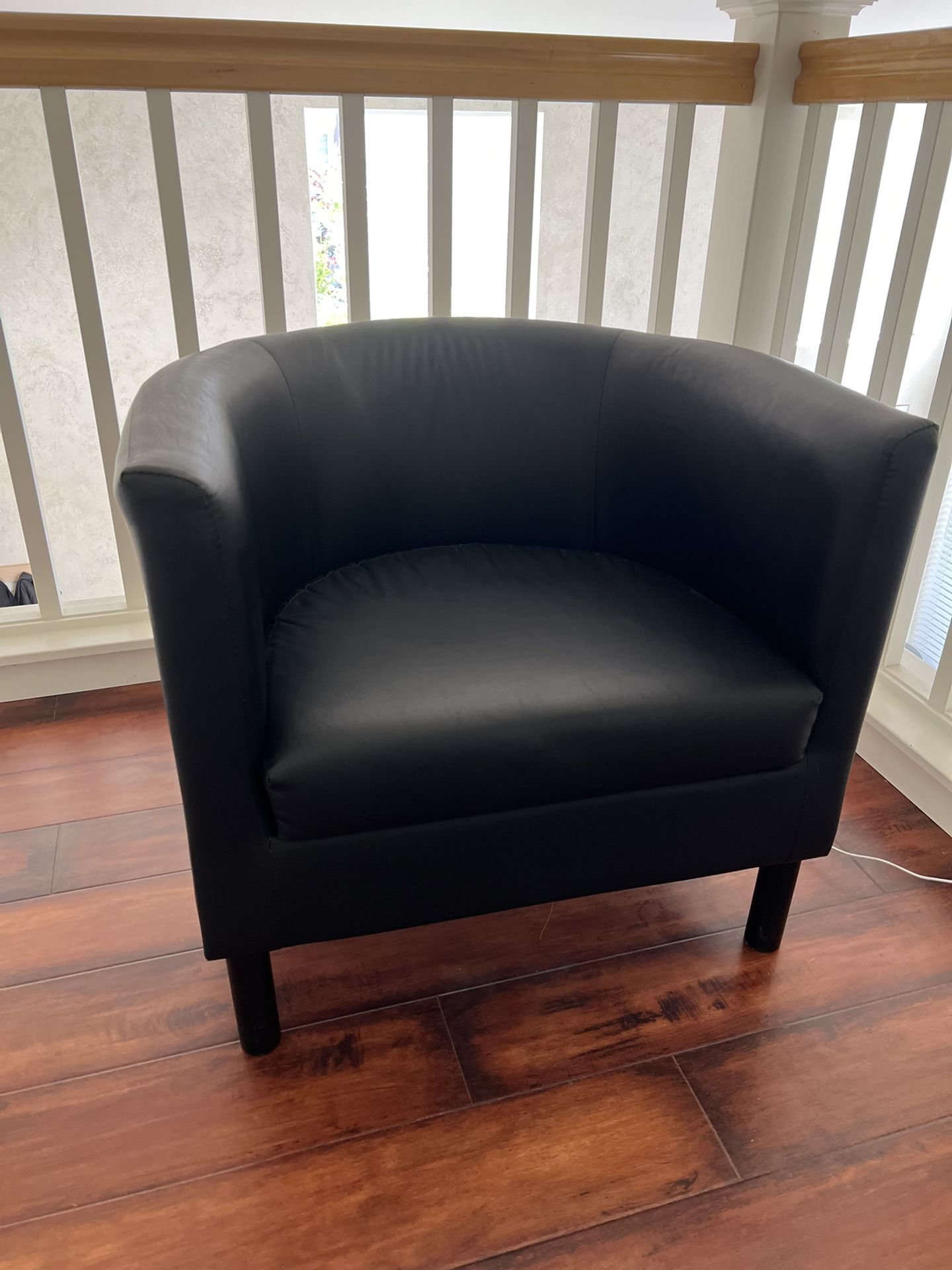 IKEA Black Leather Chair - MSRP $100