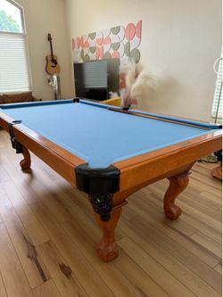 8ft Buckhorn slate pool table with cues, balls and holders, great felt condition