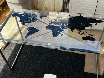 Free glass desk with image of the world map on top