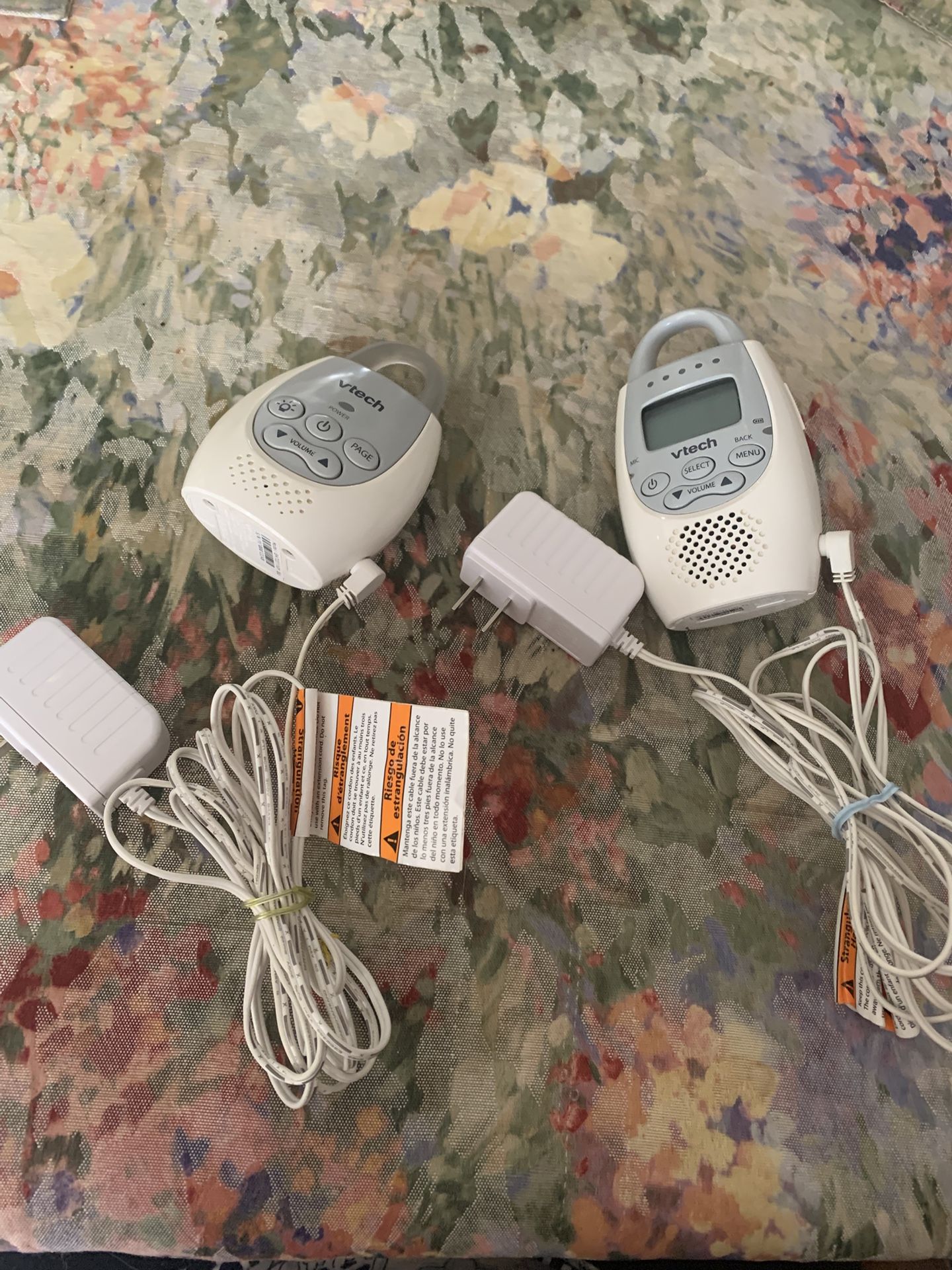 2 Vtech baby monitors. Plug in and ready to go. You are able to talk and listen on each one.