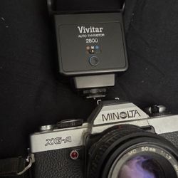 Minolta 35 mm camera and Flash