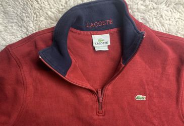 Red Lacoste sweatshirt