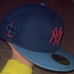 NY blue with pink hat