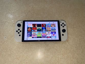 NINTENDO SWITCH OLED MOD with 512GB Loaded with 7500 GAMES