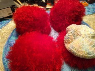 Red crocheted hats, handmade