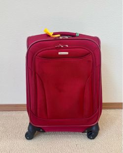 Samsonite carry on 21”