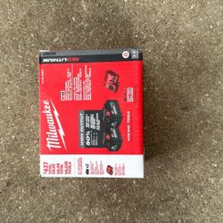 Milwaukee XC6.0 Batteries (x2) And Charger - Brand New