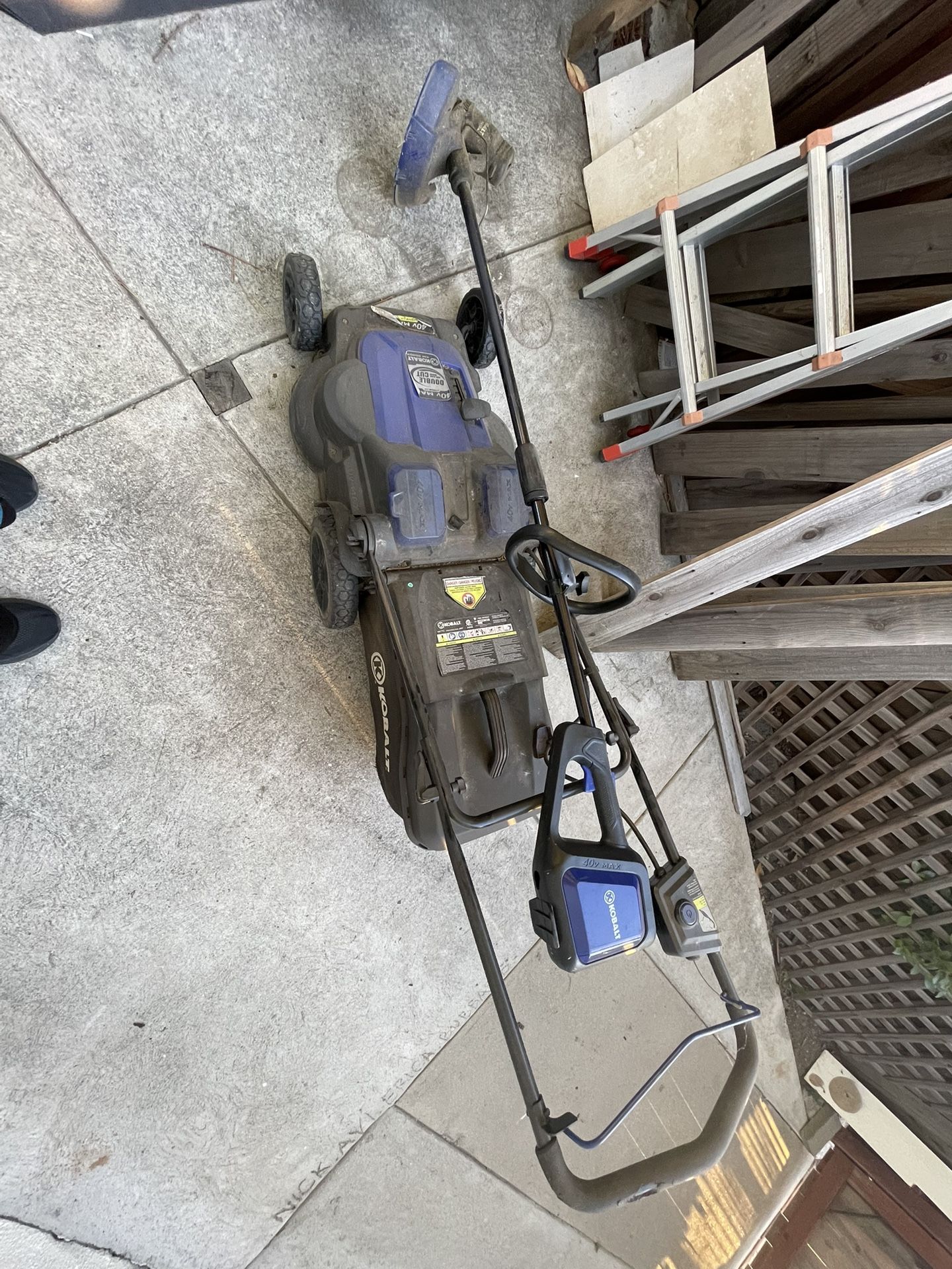 Battery Mower And Trimmer.. And A Blower Vacuum 
