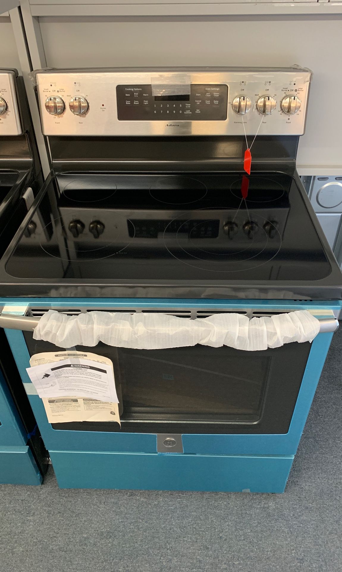 New scratch and dent GE adore stainless range 1 year warranty