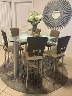 6 bar height chairs / glass counter top