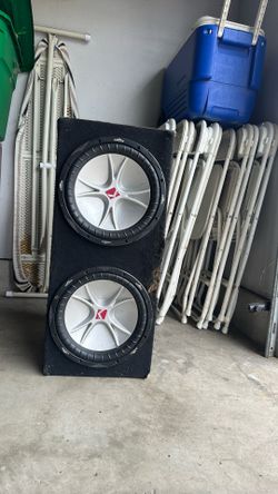 Dual 12 inch kickers in a box for a stereo system that bumps loud