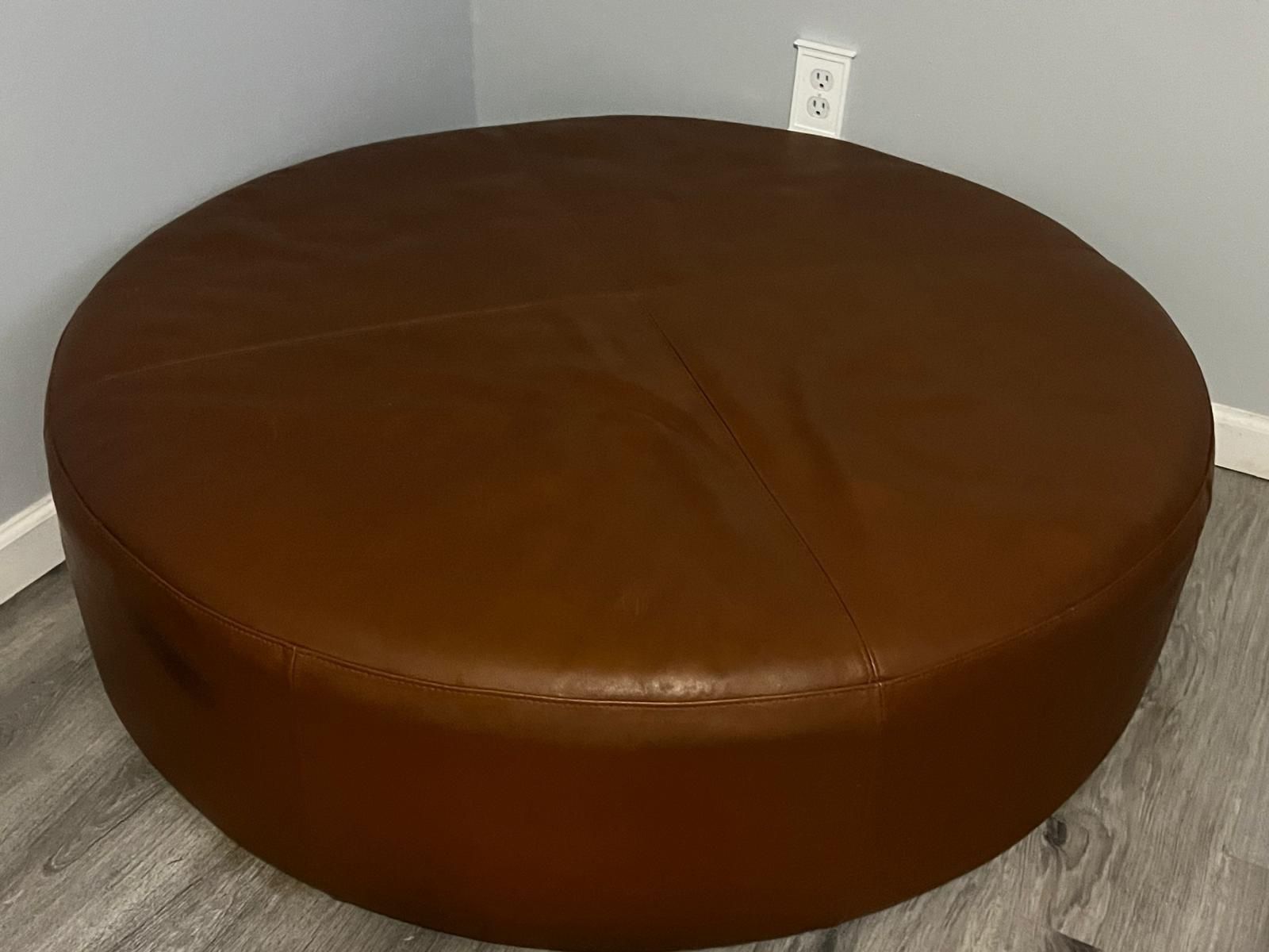 Big Round And Brown Ottoman Leather