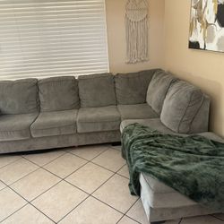 Light gray L-shaped sectional sofa