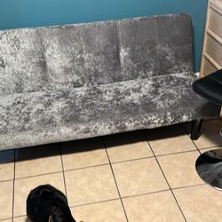 futon and chairs
