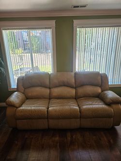 3-piece genuine leather reclining living room set.