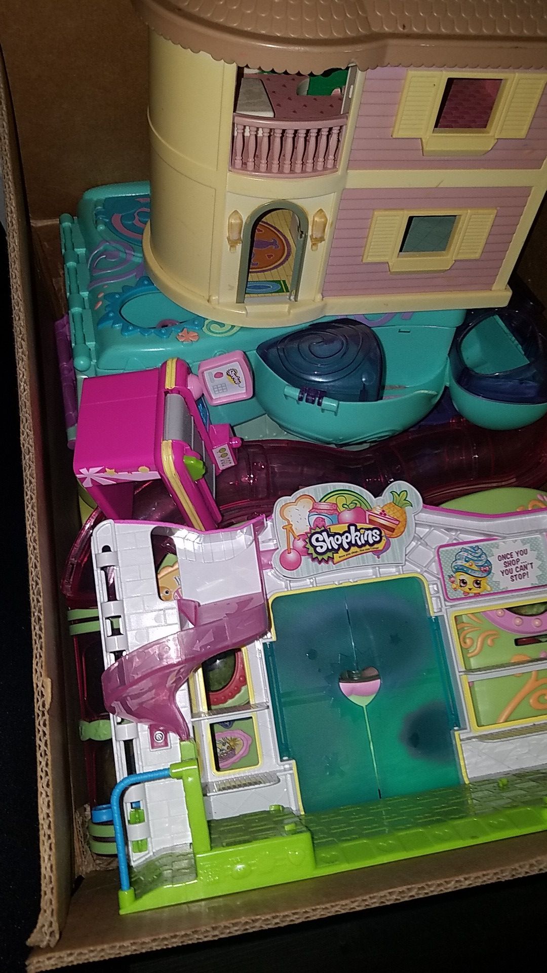 Box full of LPS and Shopkins houses