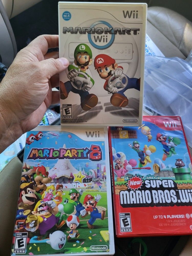 3 Nintendo Wii Games,  Mario Kart, Super Mario Bros, Mario Party 8