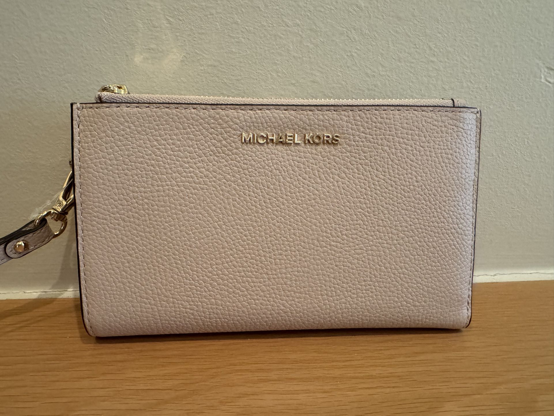 Michael Kors leather wristlet in soft pink