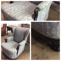 Vintage chair with wooden arms and brass studs