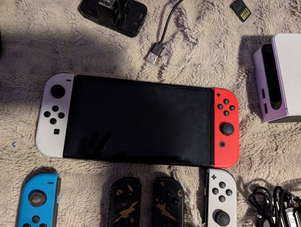 Nintendo Switch OLED with Games and Add Ons
