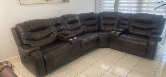 For sale: sofa with three reclining seats.