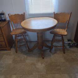 Table And Swivel 2 Chairs  