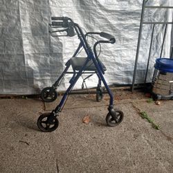 Invacare Folding Walker With Seat And Hand Break.