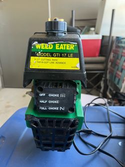 Weed eater with blades and gas