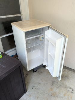 White mini fridge