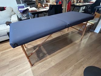 Oakworks Portable Massage table with 2 Bolsters and a set of flannel Sheets